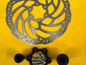 Talaria wheel adaptor including rotor for ebmx SurRon wheels